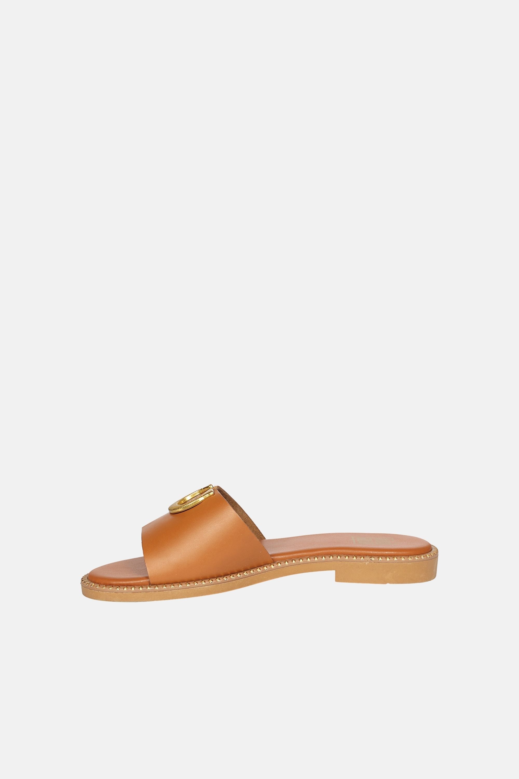 Acacia Flats by Vivi Blu showcasing the elegant cognac leather upper, highlighting the luxurious design perfect for summer outfits.